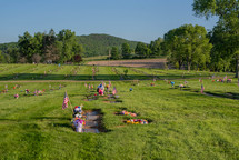 American flags at a cemetery 