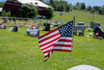 American flag at a cemetery 