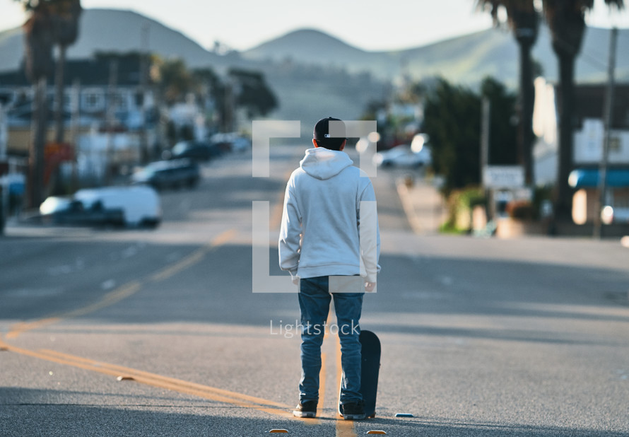 skateboarder on a road 