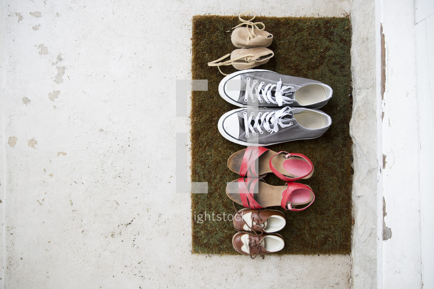 shoes on a doormat.