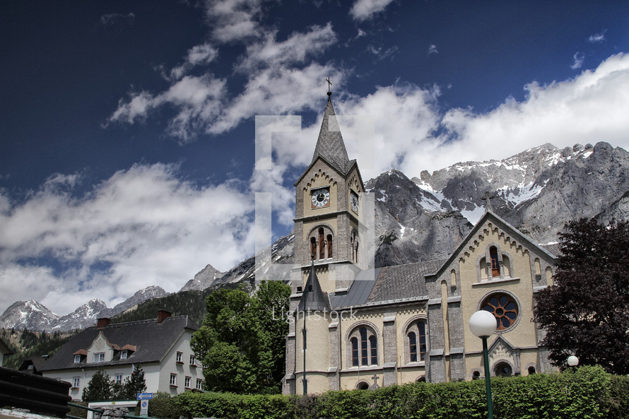 church in front of a mountain 