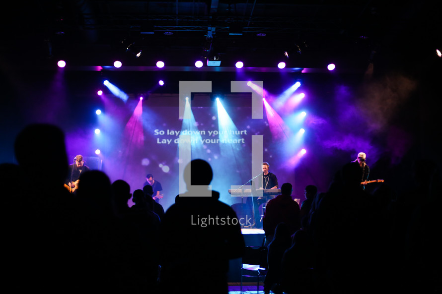 concert, projection screen, man, on stage, audience, worship service, contemporary worship service 