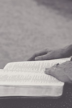 woman reading a Bible in her lap 