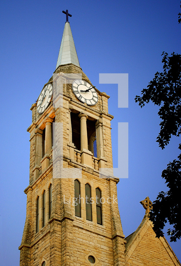 Steeple and clock tower of St. Dennis church.  