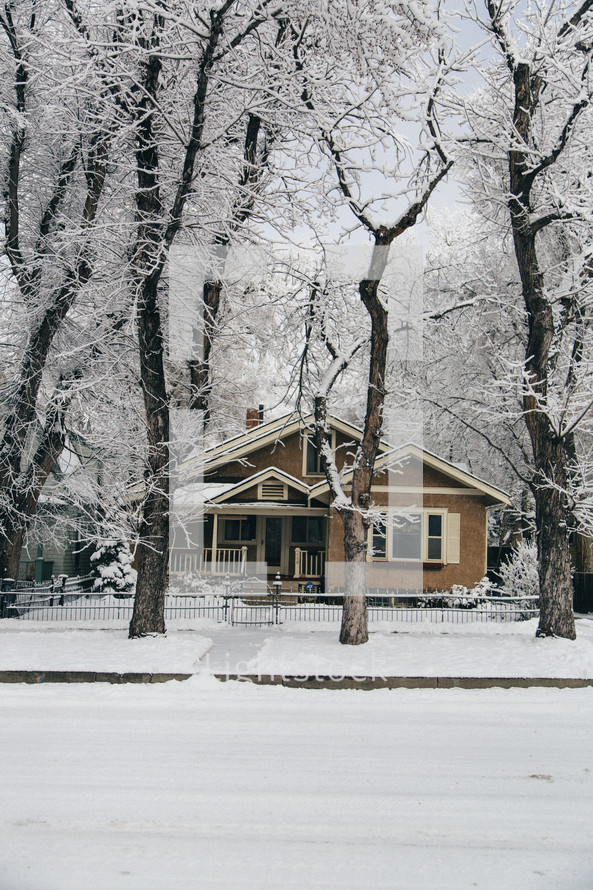 house in winter snow
