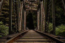 support beams over a railroad bridge 