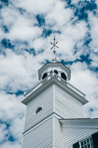 weather vane on a tower 