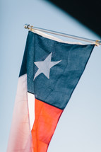 Texas flag on a flag pole 