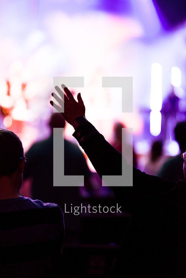 raised hands at a contemporary worship service 