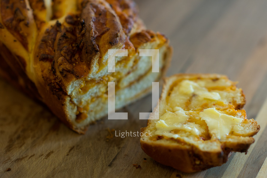 sliced buttered bread 