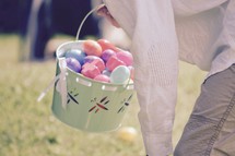 A boy child hunting for Easter eggs on Easter Sunday 