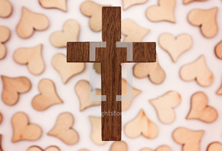 wooden cross and wood heart cutouts 