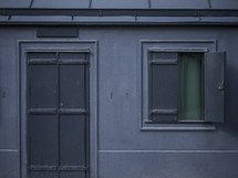 blue exterior shutters and window 