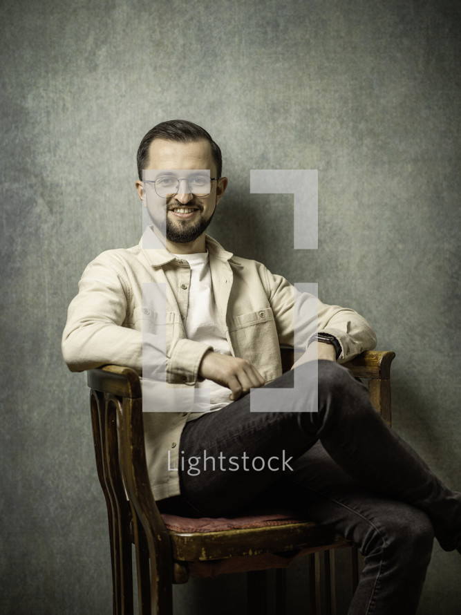 Portrait of a man in a chair
