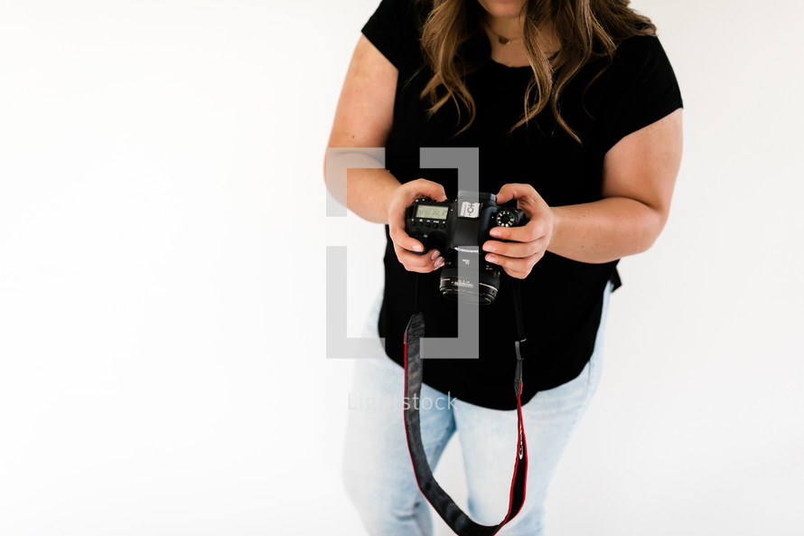 photographer holding a camera 