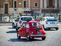 small red car in Rome 