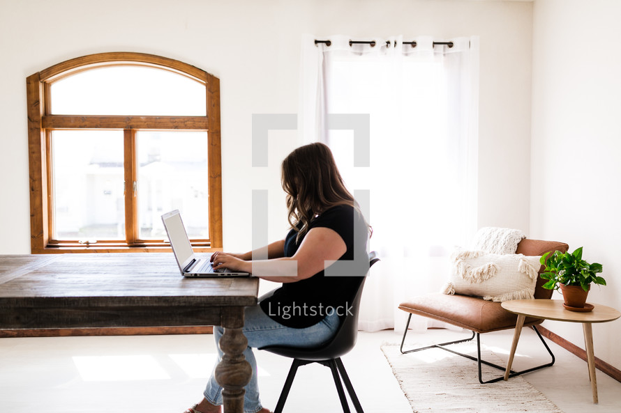 a woman working from home 