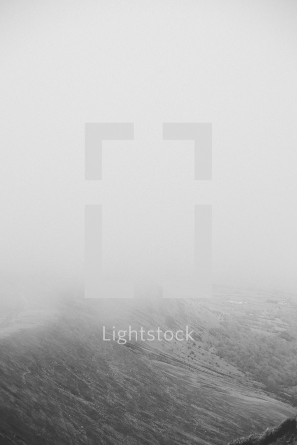 mountaintop in fog 