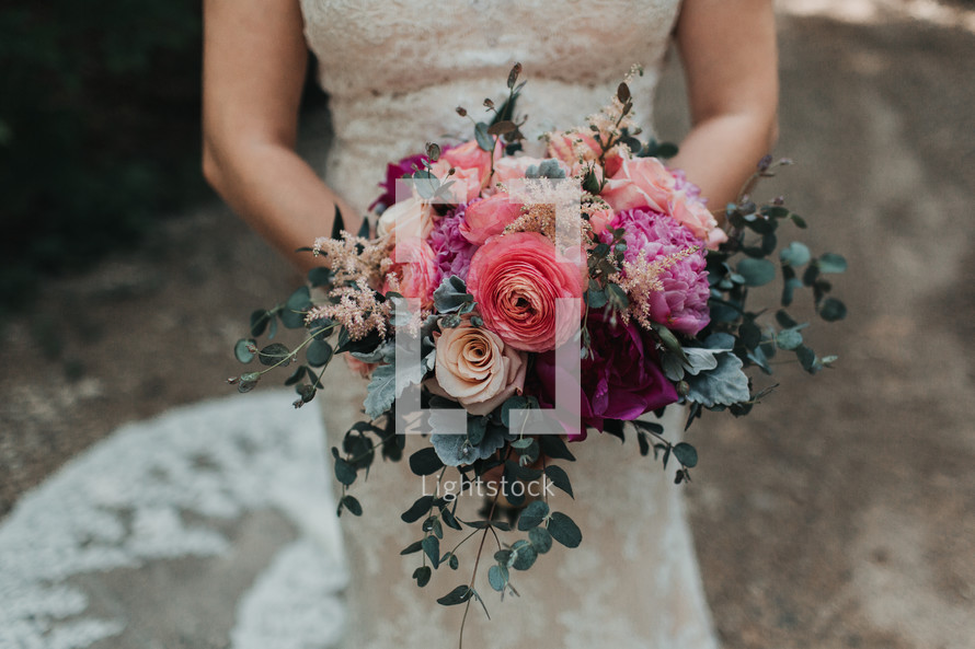 a bride holding a bouquet 
