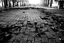broken bricks in rubble on the ground 