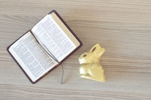 candy Easter bunny and pages of a Bible 
