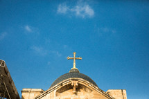 cross top on a dome on a church in Jerusalem 