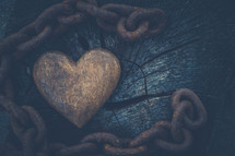 rusty chain and wooden heart 
