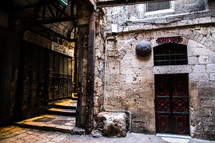 doors to buildings on a narrow street in Jerusalem 
