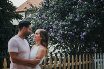 blurry image of a couple holding each other 