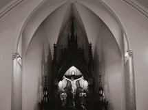 the inside of an old catholic church building