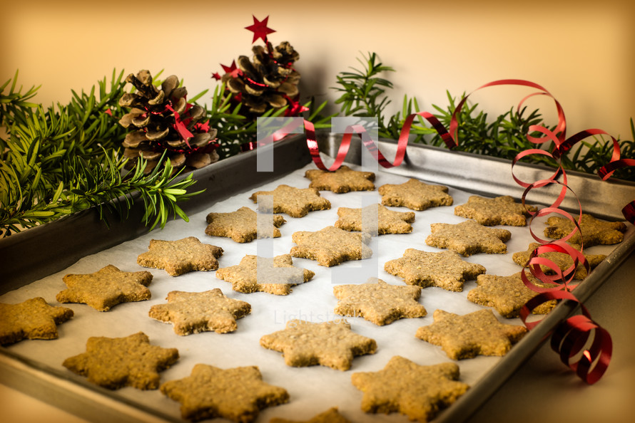 star Christmas cookies on a baking sheet 