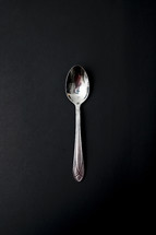 spoon on a black background 