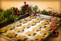 star Christmas cookies on a baking sheet 