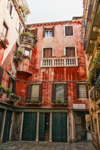 corner balcony on a red building in Venice 