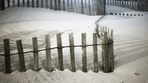 fence on a beach 