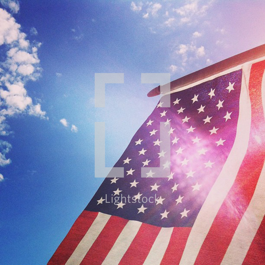 American flag waving in sunlight 