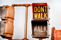 don't walk, walk, street sign at a crosswalk 