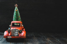 vintage red truck and Christmas tree 