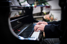 a man playing a piano 