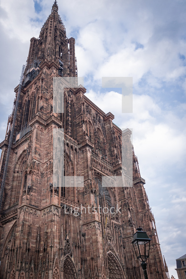 Looking up at stone Cathedral in France