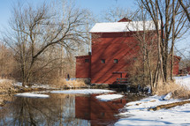 Old mill in snow.