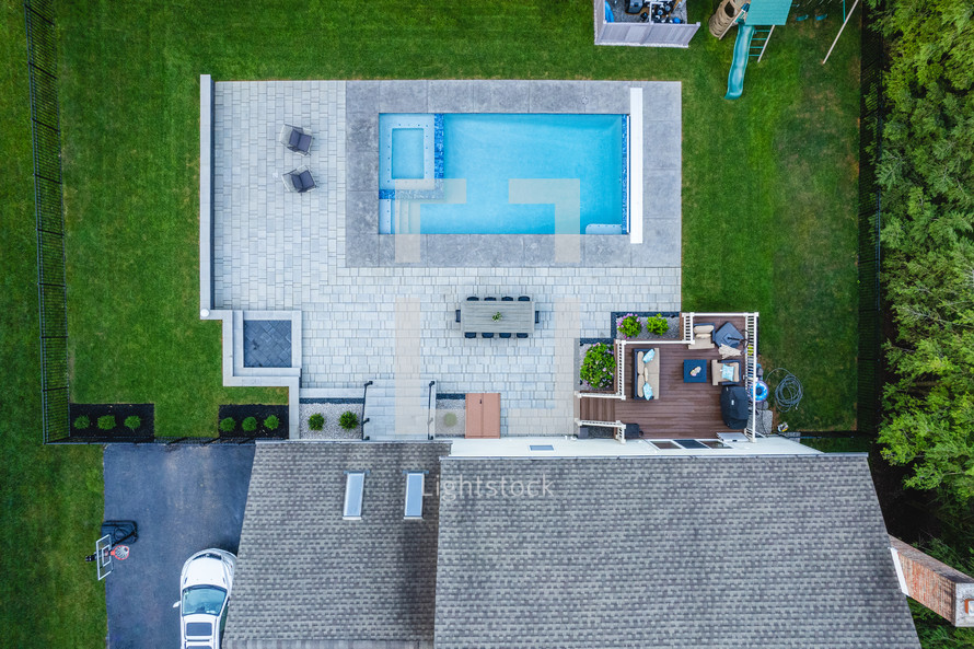 Aerial view of a large house with a pool