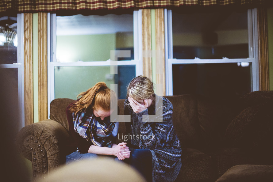 two women reading Bibles 