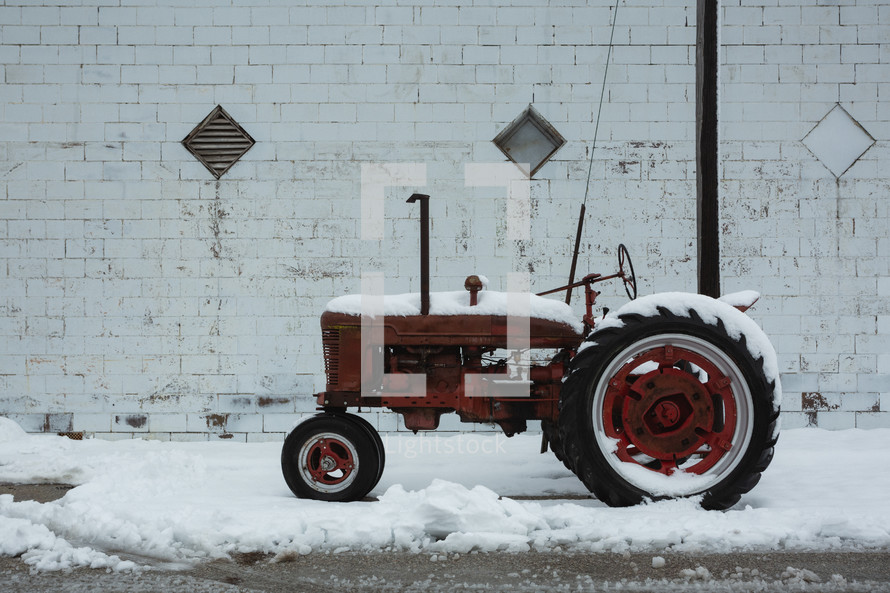 A vintage tractor truck in the snow