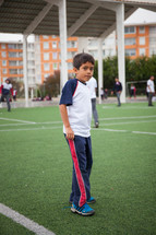 a child on a soccer field in La Serena, Chile