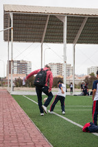 kids on a soccer field in La Serena, Chile
