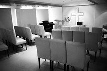 Empty chairs in a small chapel
