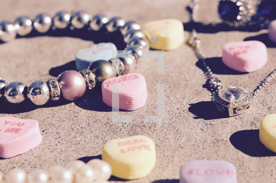 Valentines conversation hearts and jewelry 