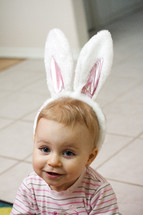 toddler girl wearing Easter bunny ears
