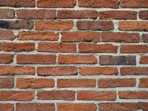 red brick wall useful as a background